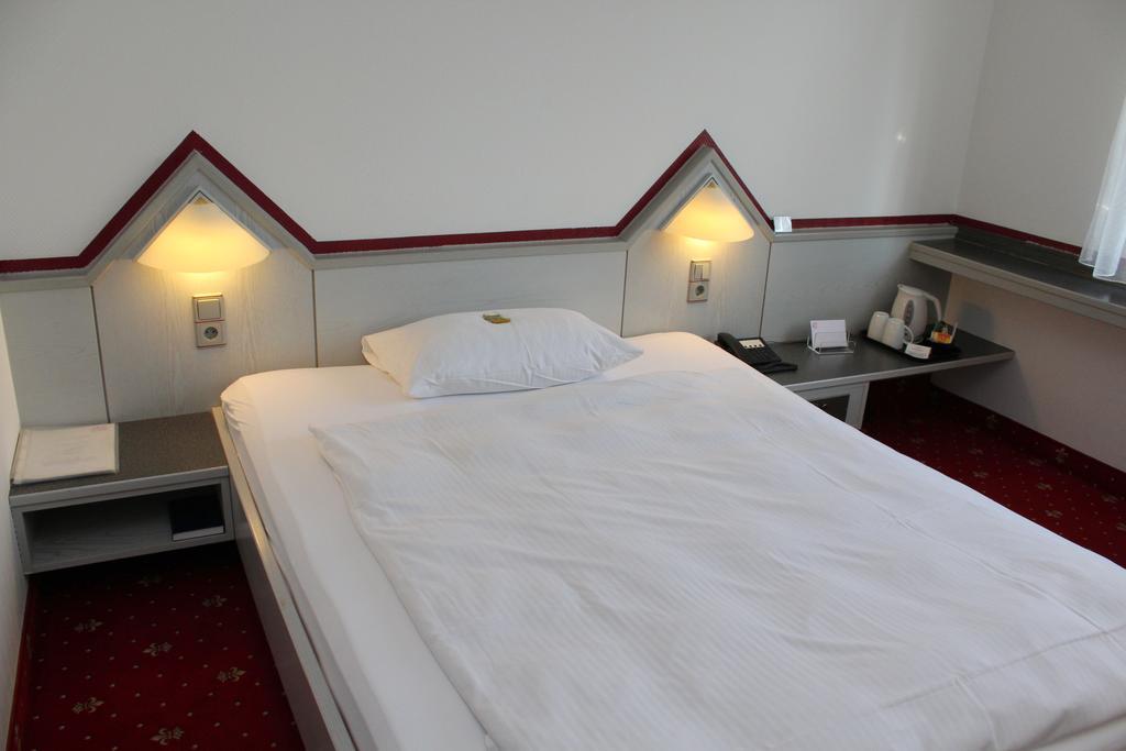 A.C. Hotel Hoferer Estugarda Quarto foto