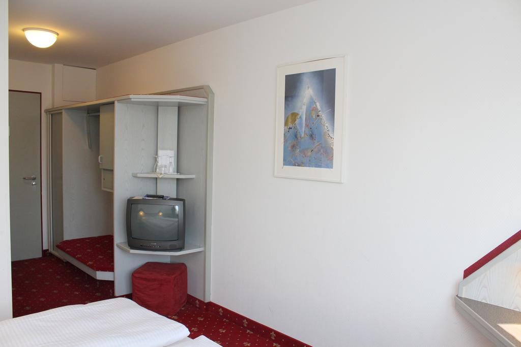A.C. Hotel Hoferer Estugarda Quarto foto