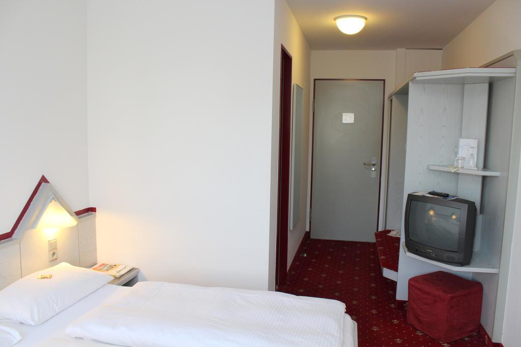 A.C. Hotel Hoferer Estugarda Quarto foto